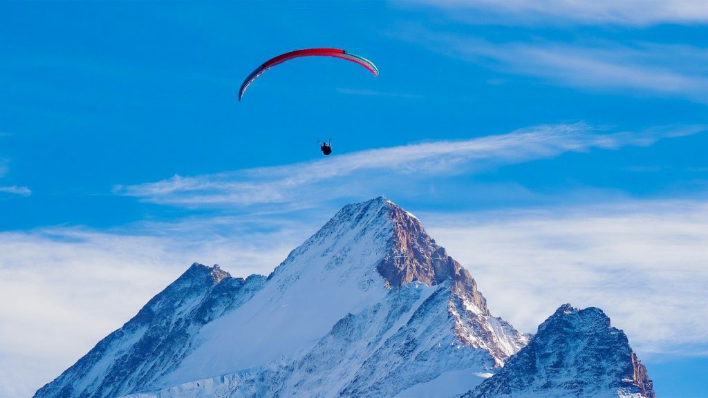 Paragliding, Swiss alps, overseas adventure travel 2024